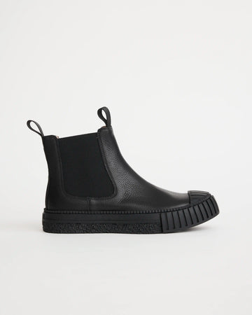 Black leather Chelsea boot on a white background