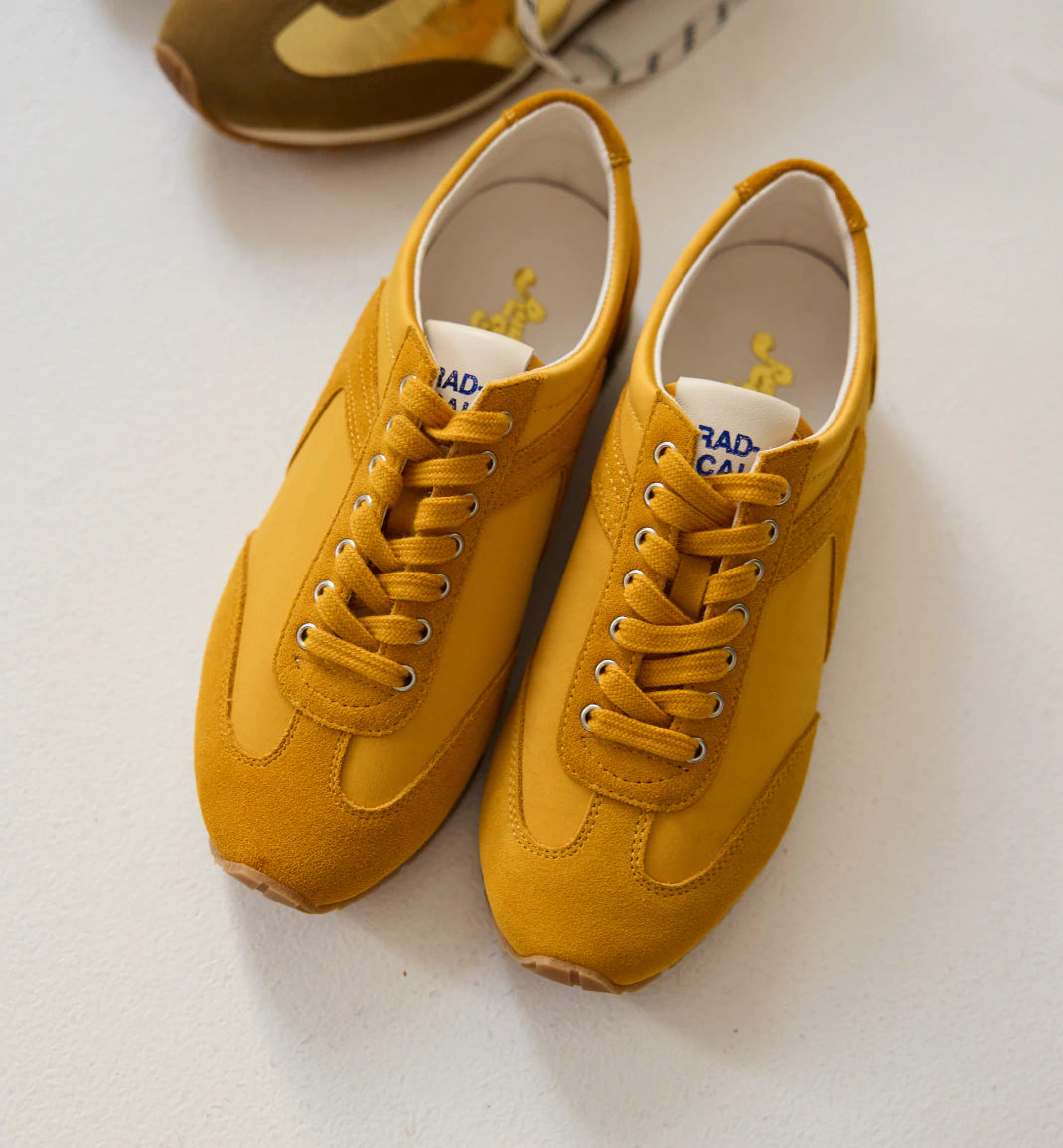 Golden yellow sneakers discount
