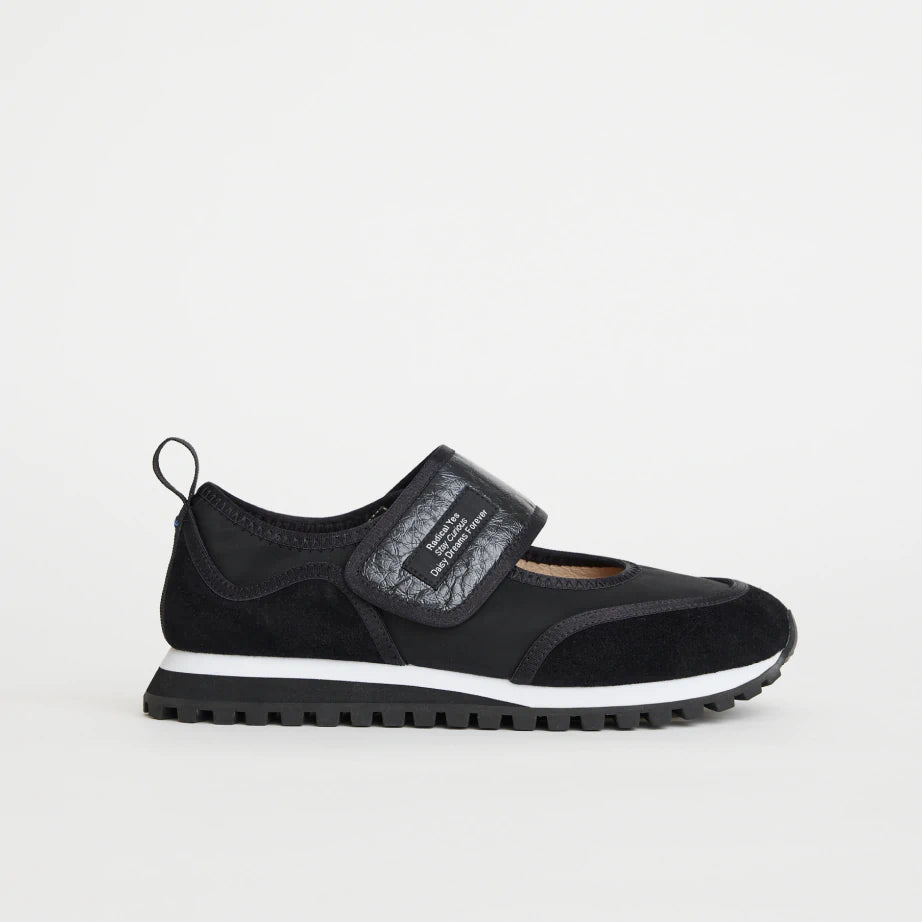 Women's retro velcro sneaker made from black suede, neoprene and crushed black leather. Features pull tab and removable insoles.