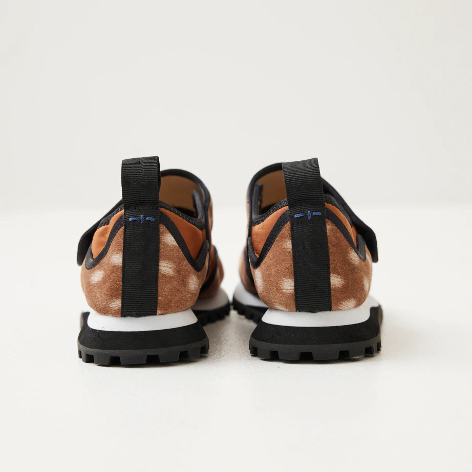 A pair of women's retro velcro sneakers in fawn pattern material and featuring a removable insole.