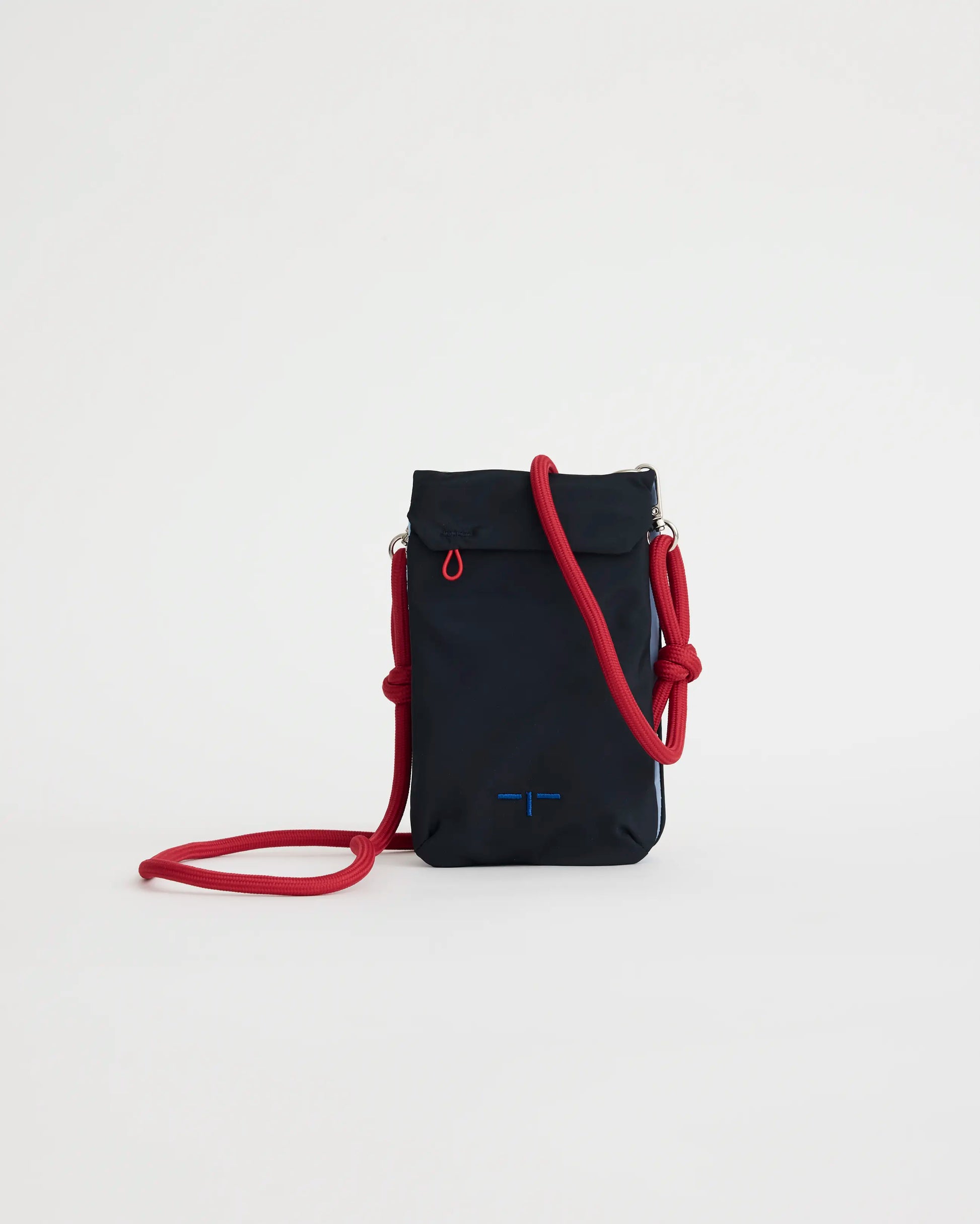 Blue crossbody phone pouch with a red strap on a white background
