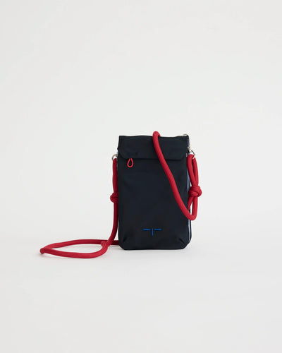 Blue crossbody phone pouch with a red strap on a white background