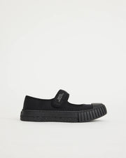 Black velcro mary jane on a light gray background