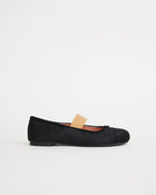 Black pony hair textured leather flat shoe on a white background