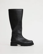 Black leather knee-high boot on a light gray background