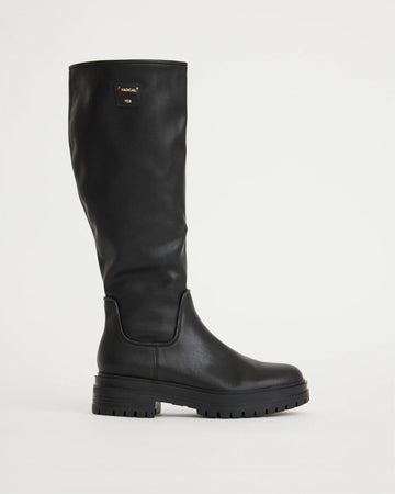 Black leather knee-high boot with a chunky black sole on a white background