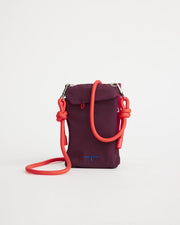 Purple phone pouch with a pink strap on a white background