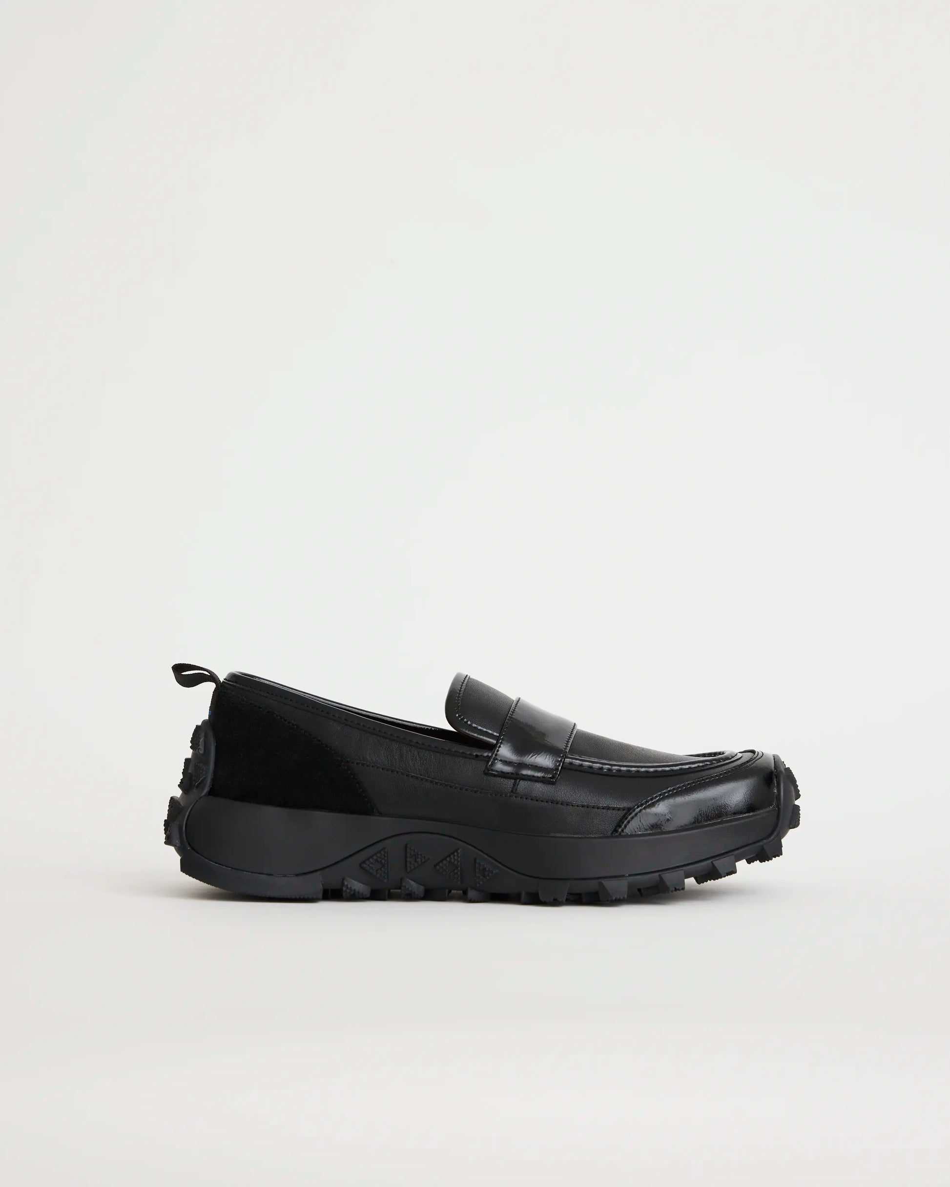 Black leather sporty loafer shoe on a white background