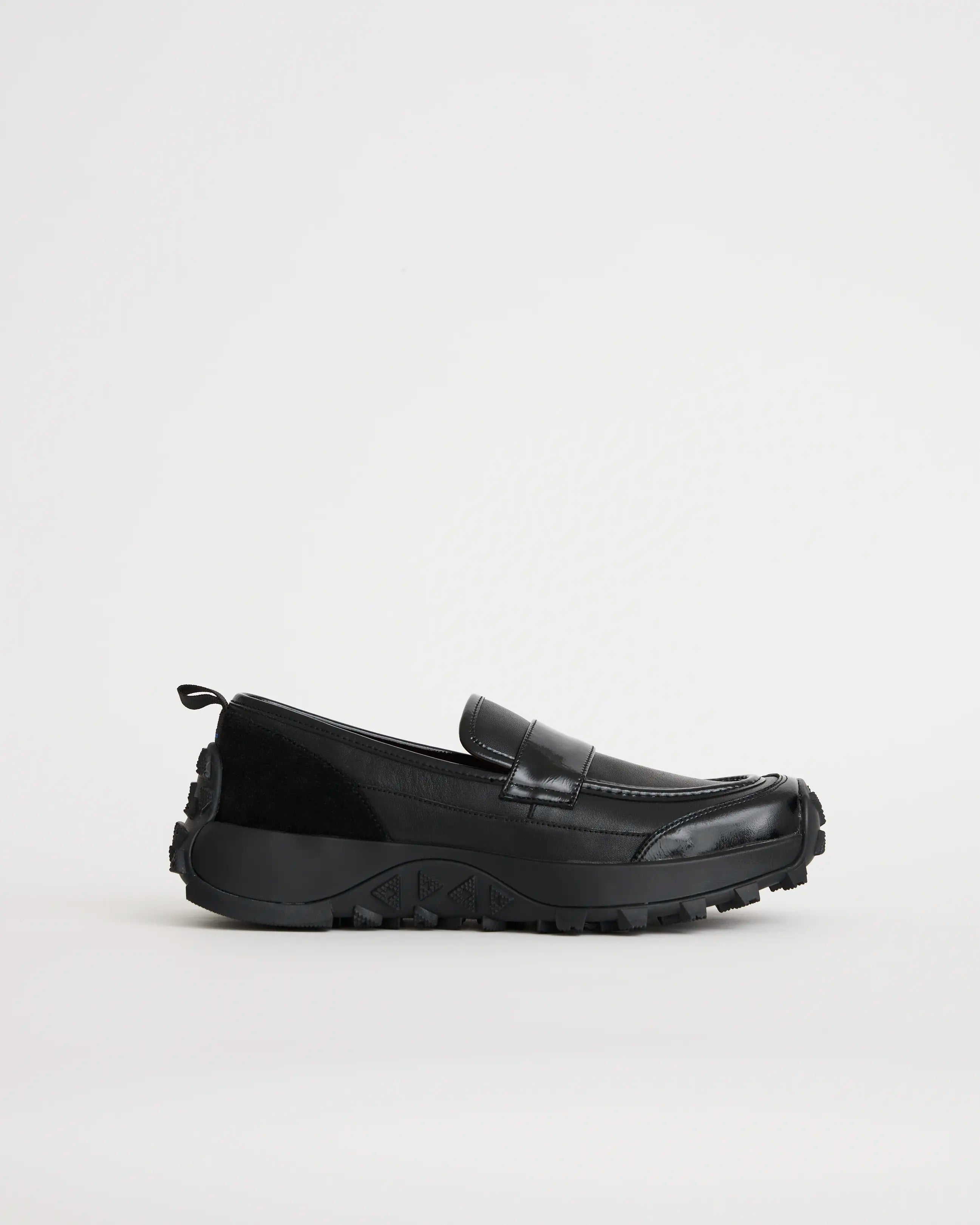 Black leather sporty loafer shoe on a white background
