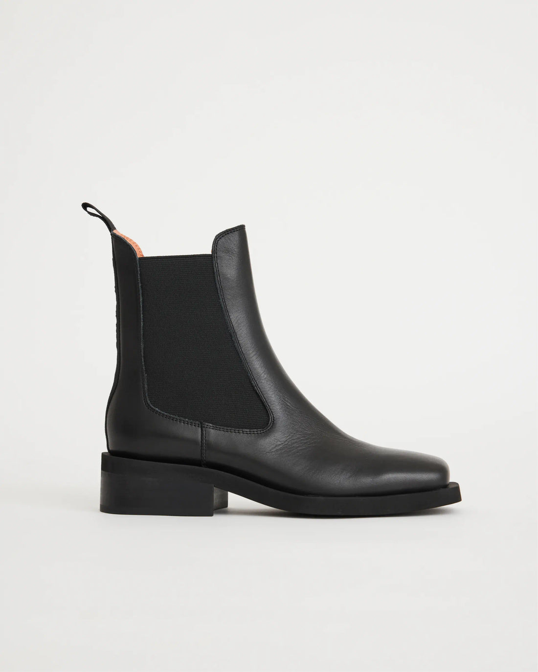 Black leather square toe chelsea boot with a black sole.