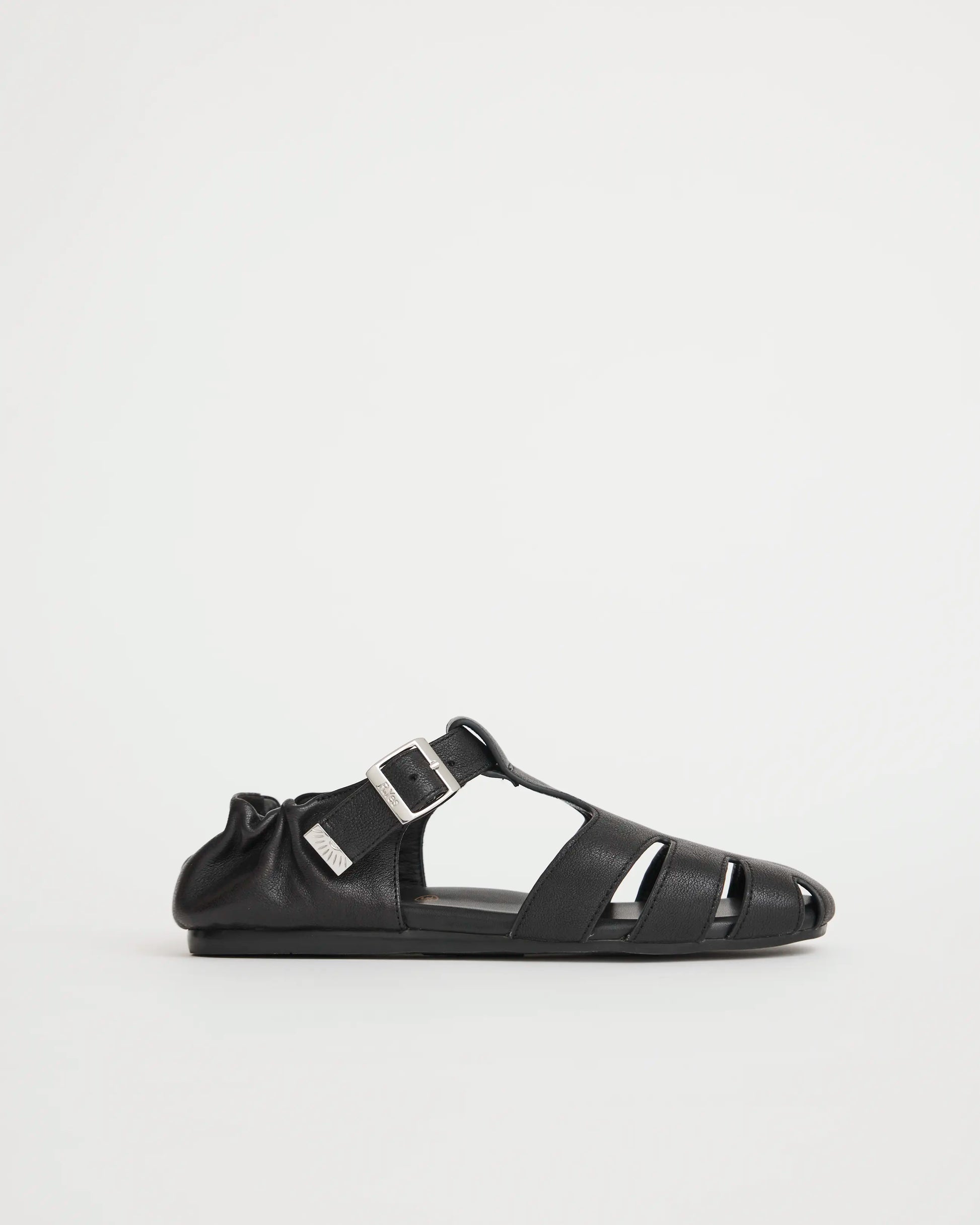 Black fisherman sandal with multiple straps on a light gray background