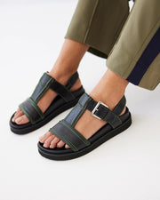 Visby T-Bar Sandal | Black leather with Green Topstitch