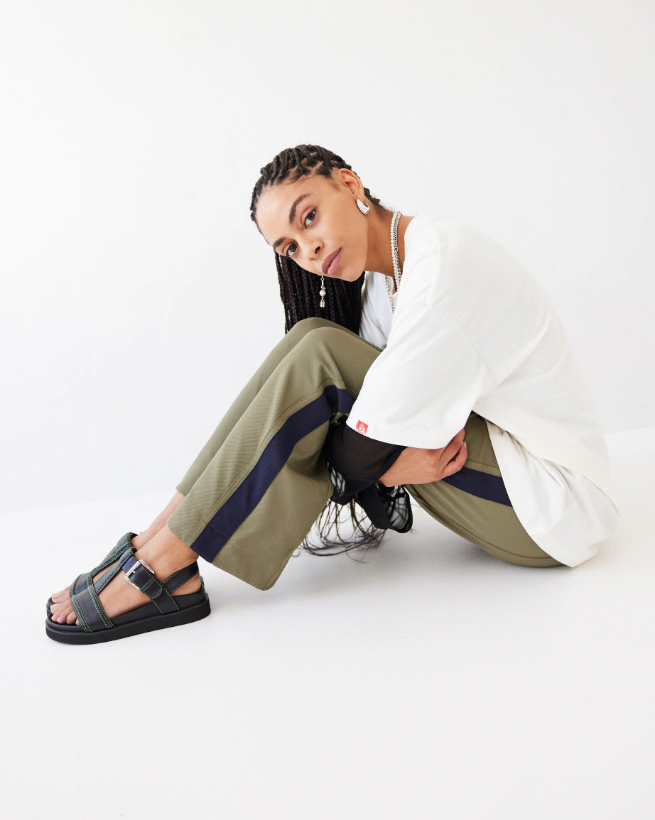 Visby T-Bar Sandal | Black leather with Green Topstitch