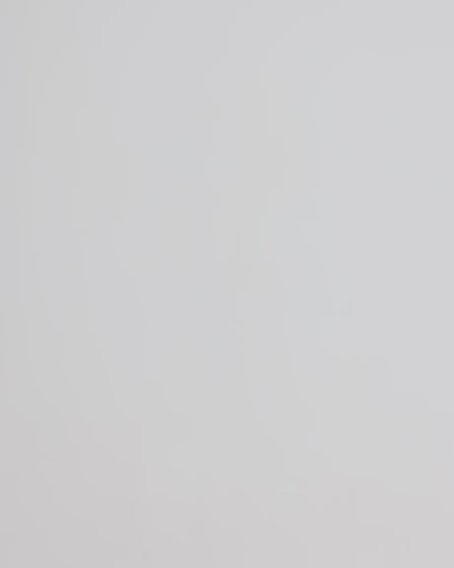 Load video: Person walking in the frame with a purple phone pouch and a crossbody orange strap.