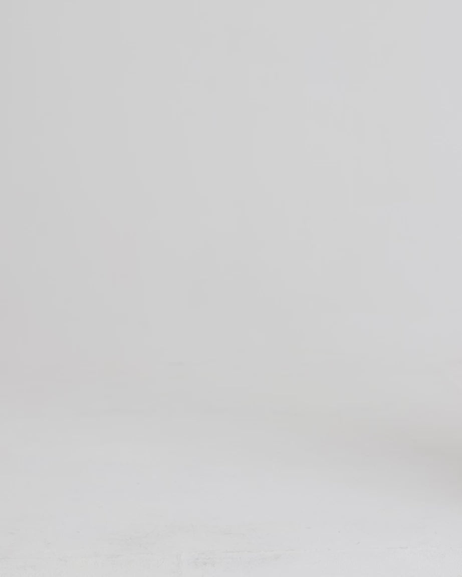 Load video: Person walking with a yellow handbag.