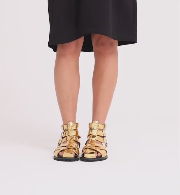 Load video: Like This Warrior Sandal | Gold