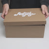 Unboxing video of the Angel Slingback in snake printed leather.