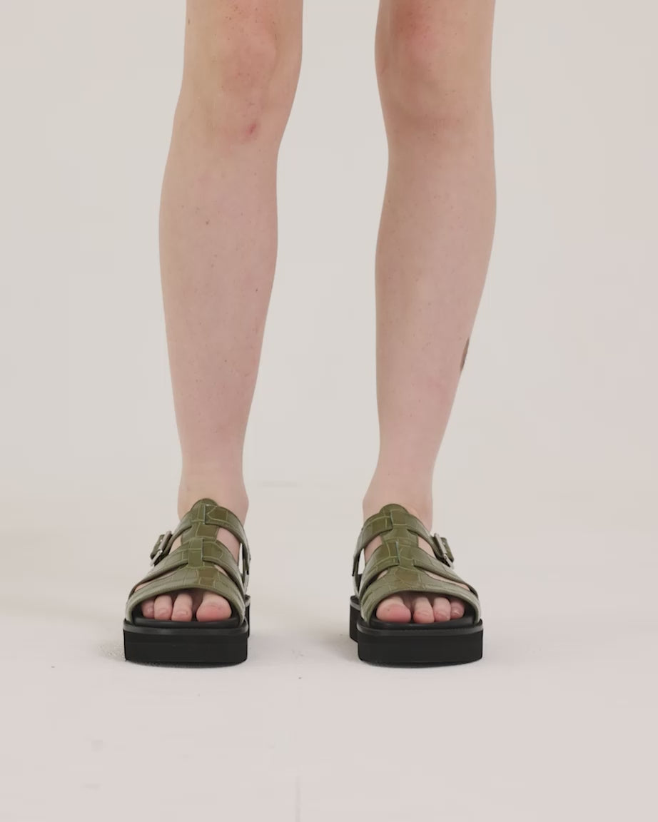 Load video: Volta T-Bar Sandal | Moss Green Croc